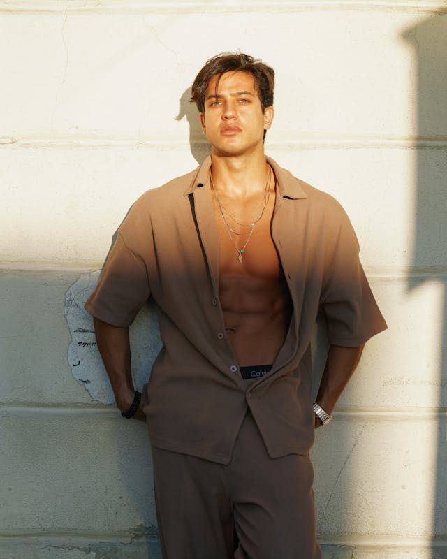 Leaning against a wall pose