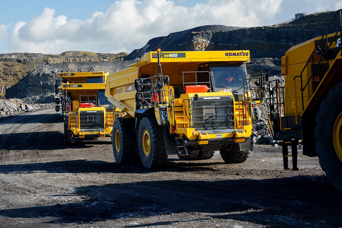 Komatsu HD605 Dump Truck Lineup at Roadstone Quarry