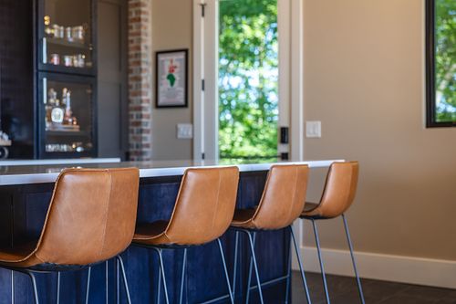 Leather bar stools at island