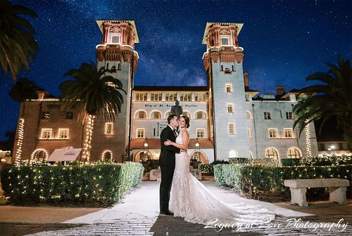 Wedding couple at Lightner Museum during a night ceremony in St. Augustine by Legacy of Love.