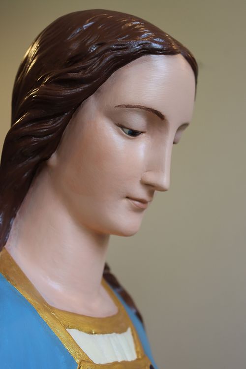 Statue of Mary's face after restoration