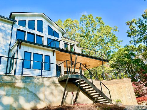 Steel stair down to lower lawn