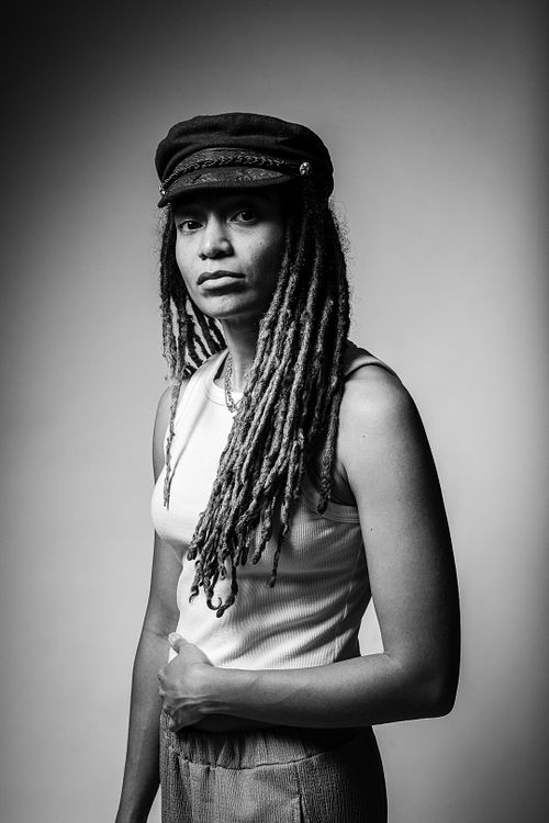 Candid studio portrait of Gaia laughing under softbox and strobe lighting — lifestyle portrait by David Andrade, Las Vegas