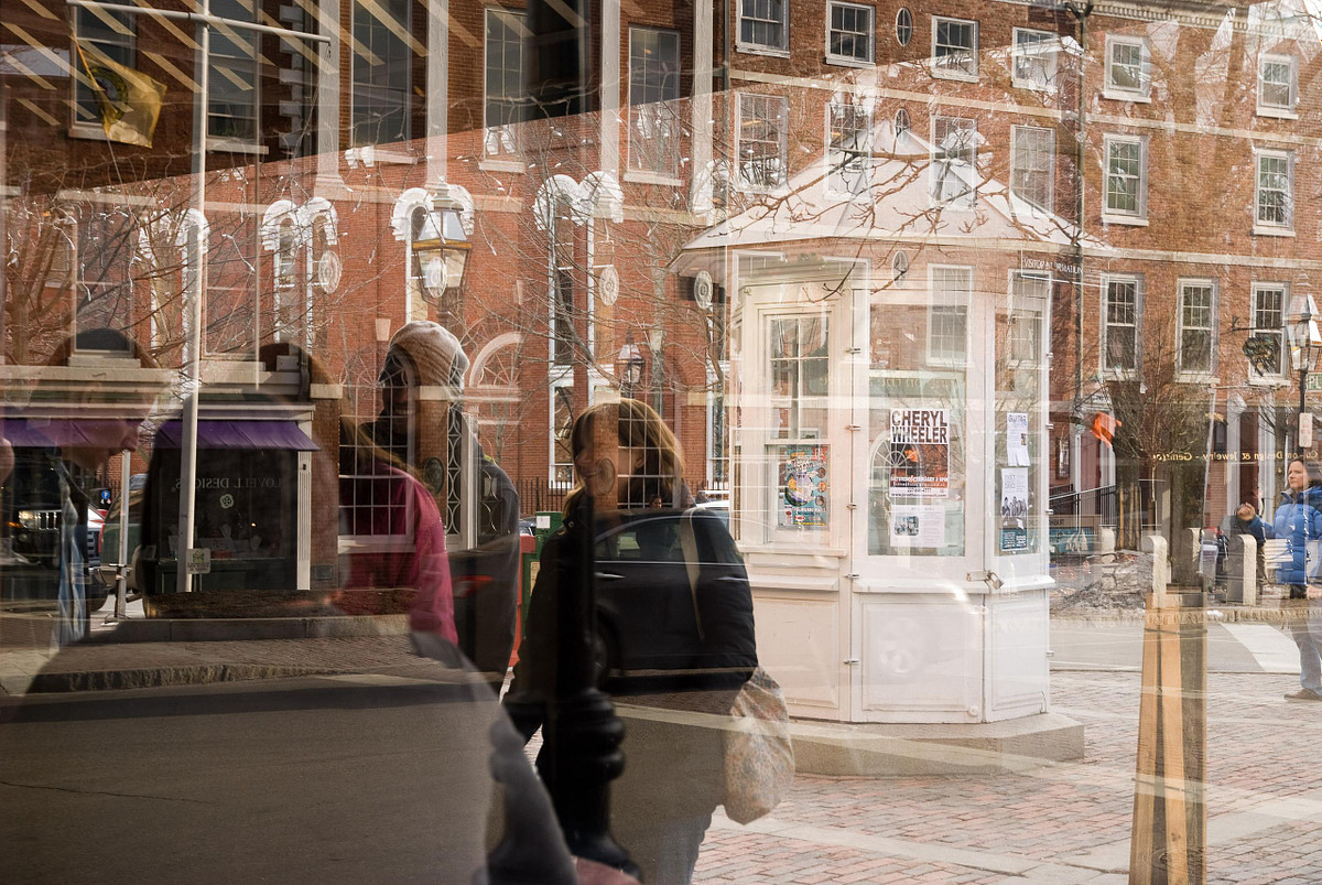 Portsmouth NH square as seen through glass restaurant window
