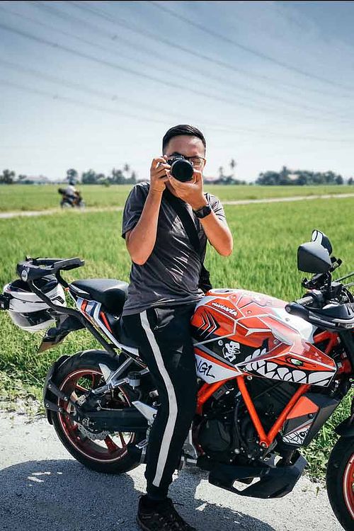 Photograph of me on my Grandpa's Suzuki RC70.