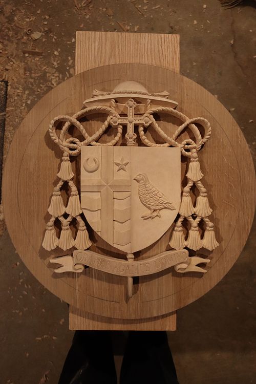 Coat of Arms on oak disc Bishop Shawn McKnight Jefferson City, Missouri