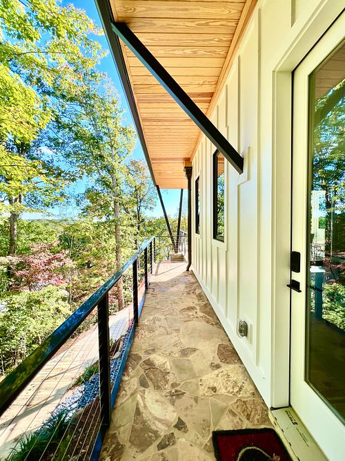 Side walk from man cave to covered patio