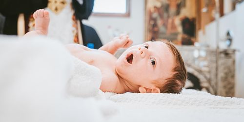baby baptism ceremony at Ottawa church captured by Kameel Photography