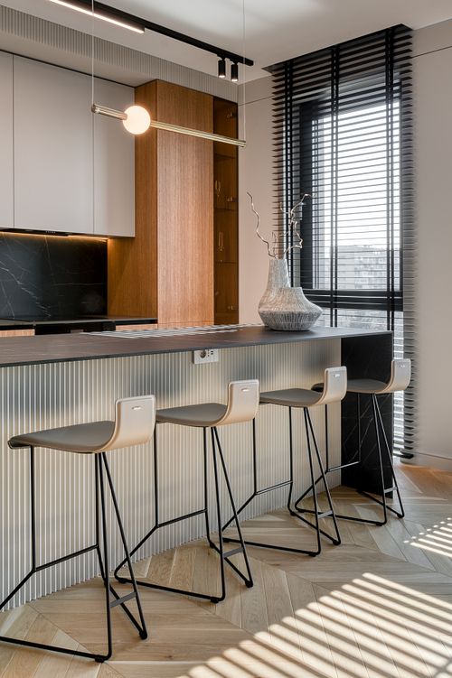 Kitchen design featuring interplay of light and textures for a minimalist aesthetic &ndash; Herculane project