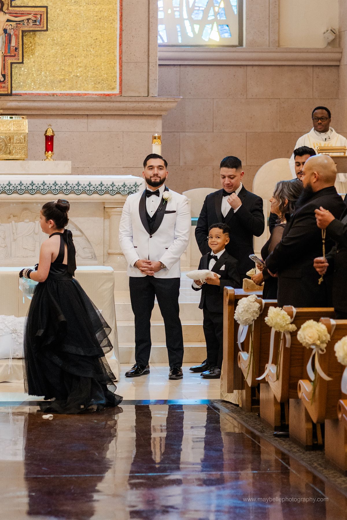 Exchanging vows at Saint Joseph, Husband of Mary Roman Catholic Church in Las Vegas Wedding Photography