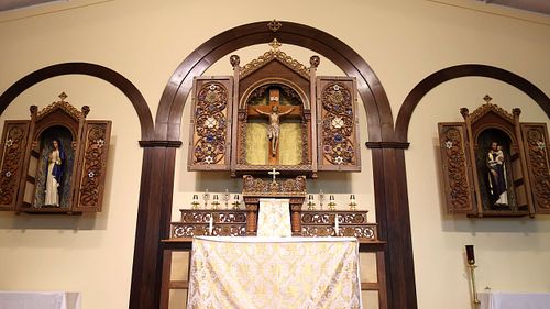 Showing the three primary shrines in the sanctuary at St. Bernadette's.