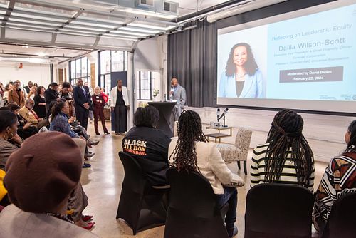 Audience listens to Dalila Wilson-Scott during a leadership equity fireside chat hosted by the Urban League and Comcast NBCUniversal Foundation.