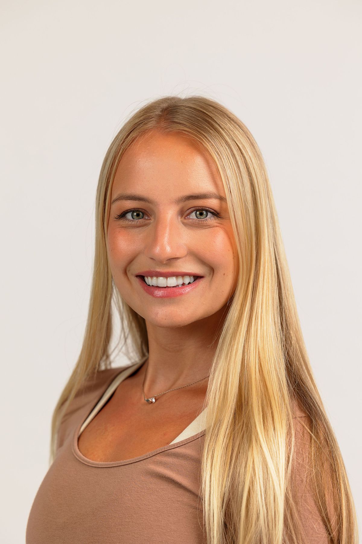 A close-up headshot of a woman against a white backdrop at Innovate Carolina's offices in Chapel Hill, NC
