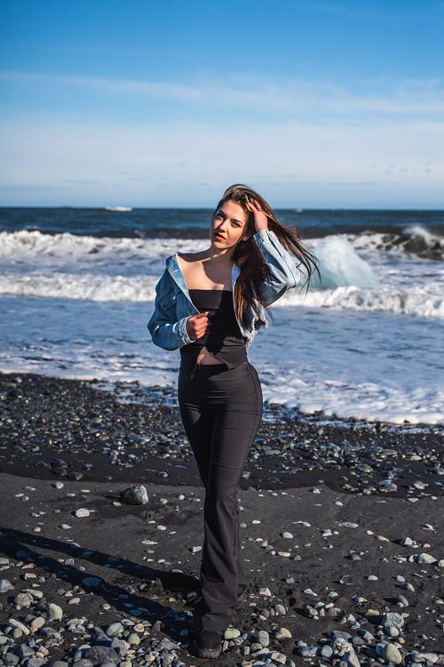 Solo modern portrait at black beach in Iceland