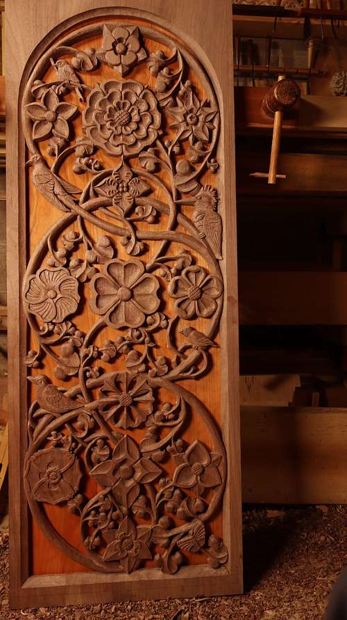 One of the door panels for the Altarpiece carved and ready for finish