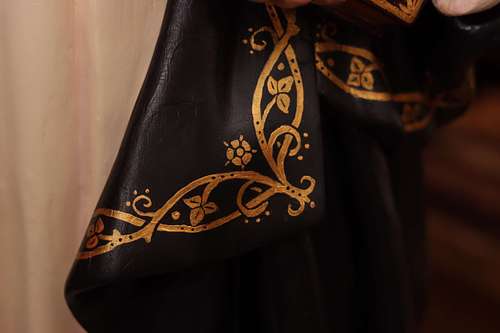 detail of the gold floral trim for the St Rose statue restoration