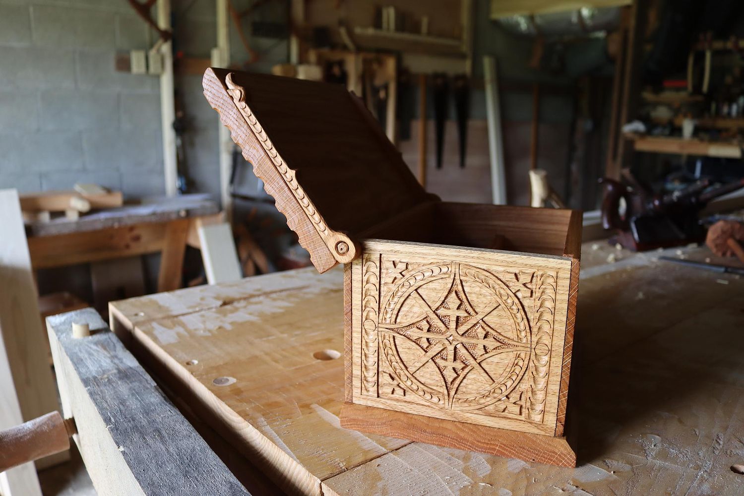 showing the gothic carved box with the lid open from the other side