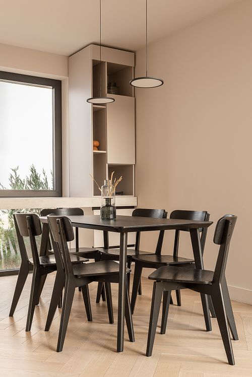 Minimalist dining area highlighting refined design elements &ndash; Faget project