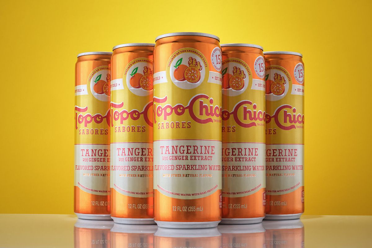 5 orange beverage cans with a drop reflection in an analogous color scheme.