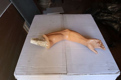 Missing Arm of St John Statue