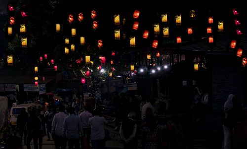 people, crowd, night shoot, celebrations, light lamp, colourful lights