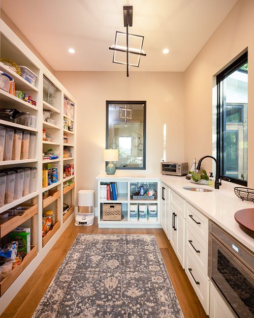 Overall view of Pantry showing the different work station areas and open shelving