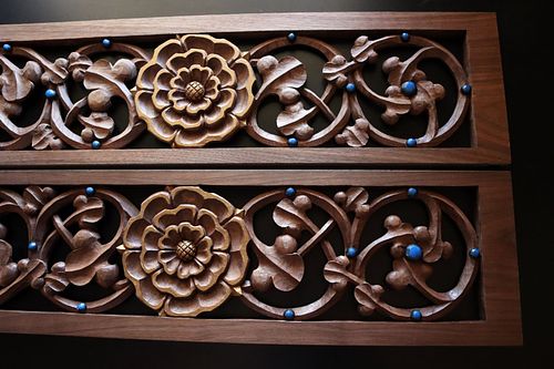 Hand-carved panels of roses and vines for the high altar gradines by Wes and Kelly Baker