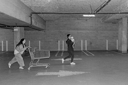 family with a baby in Costco parking lot