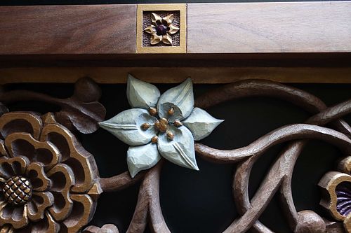 hand-carved and polychrome painted lily for St. Joseph Shrine by Wes and Kelly Baker of Contrasts Woodcarving
