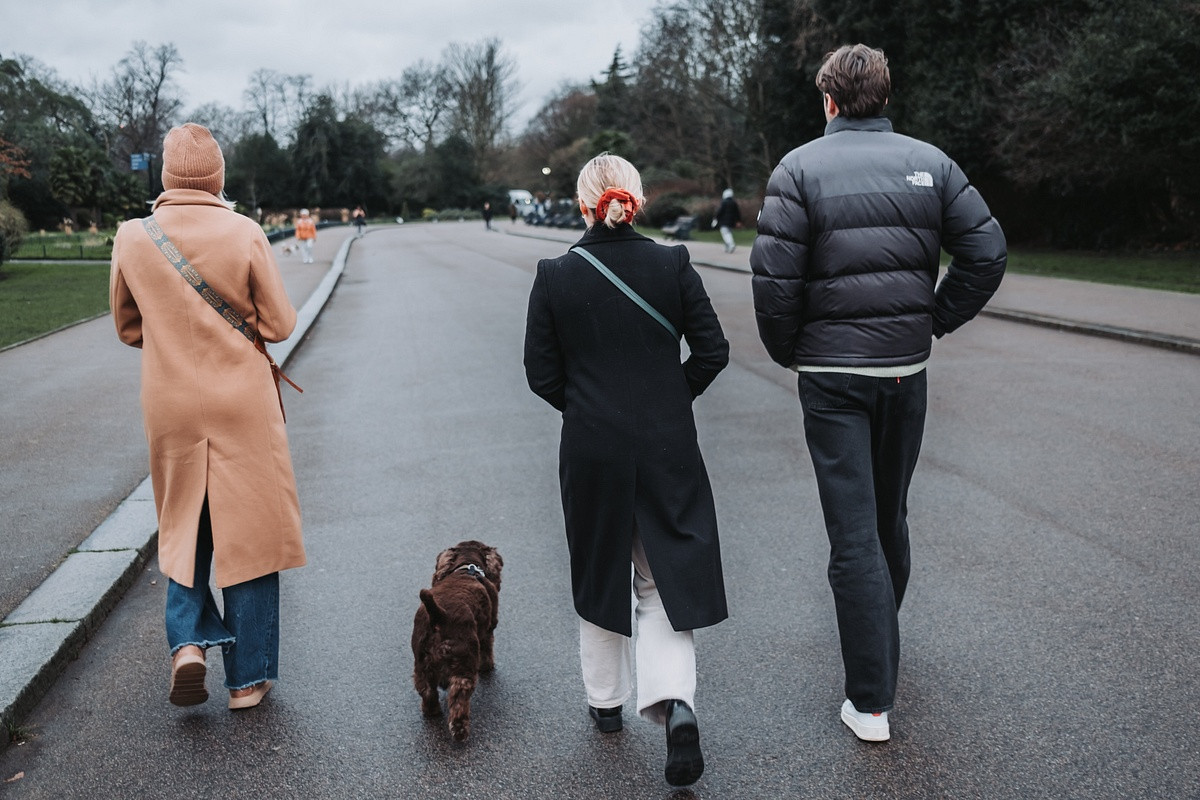 People walking in Victoria park with dog