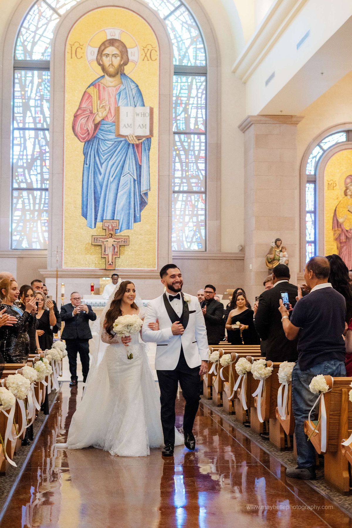 Exchanging vows at Saint Joseph, Husband of Mary Roman Catholic Church in Las Vegas Wedding Photography