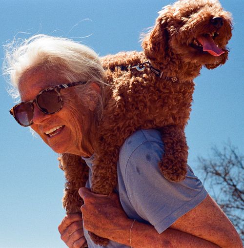 Old white lady and dog on a hike in Los Angeles