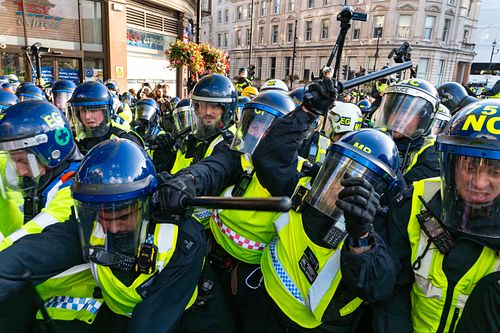 Violent clashes at “Unite the Kingdom” march, London, UK