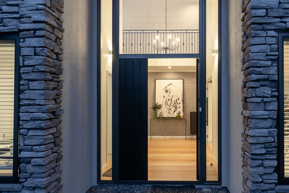 Twilight architectural photography of a modern residential home in Rototuna, Hamilton by Flax Cove Studio.