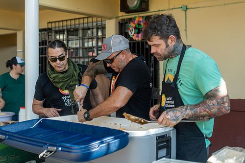 World Central Kitchen volunteers distributing food in Acapulco after Hurricane Otis — photographed by David Andrade